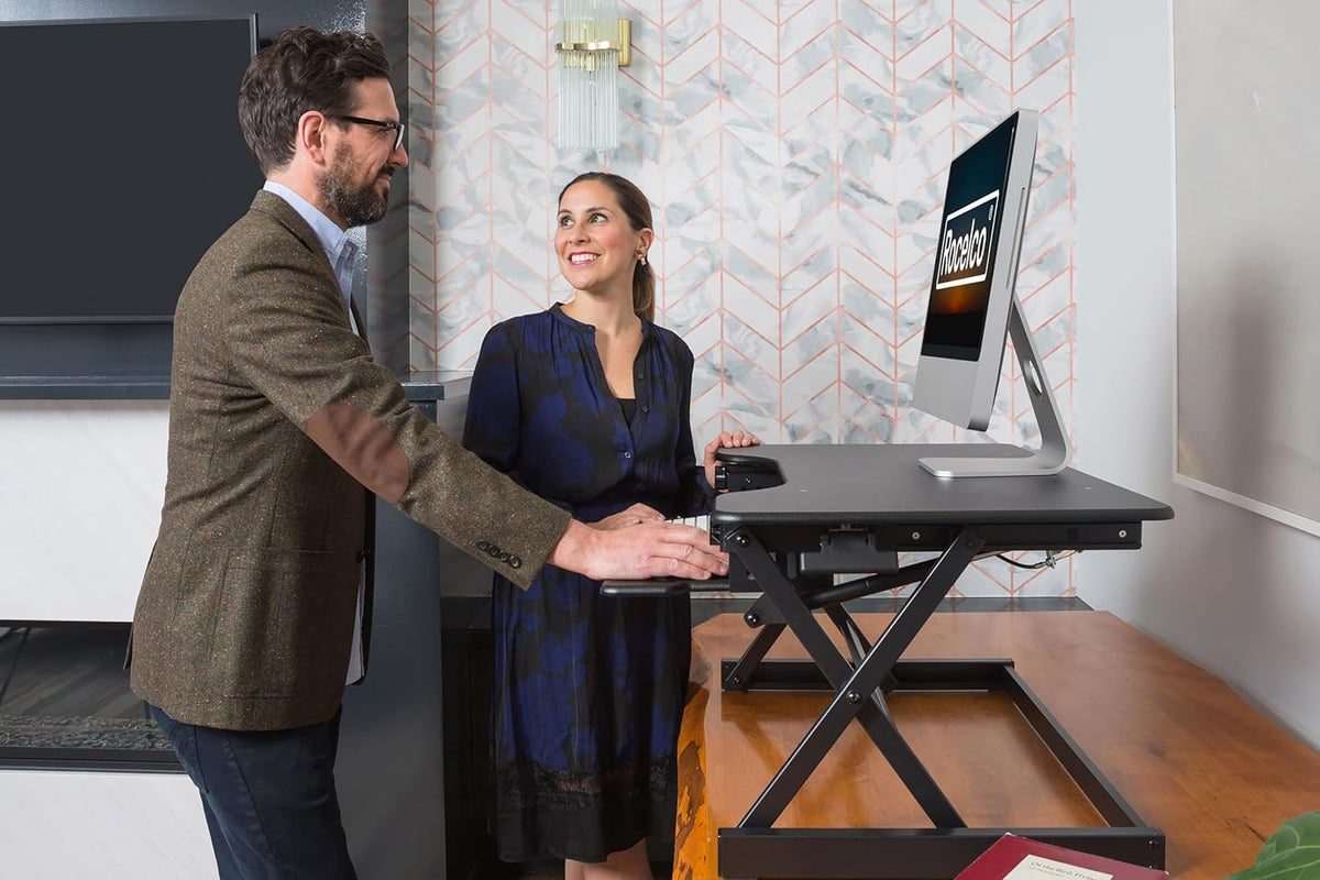 Rocelco 40" Height Adjustable Standing Desk Converter with AC Outlet USB Charger and Anti-Fatigue Floor Mat - Sit Stand Up Tabletop Riser - Sliding Keyboard Tray - Black (R DADRB-40-ACUSB-MAFM)